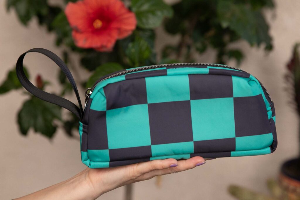green and black checkered bag